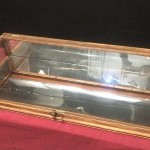 Old curved counter display case.