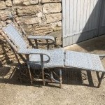 Old garden deck chair, winter garden.