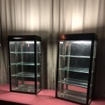 Pair of antique shop wall display cases.