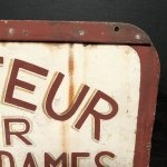 Old street sign. Hairdresser.